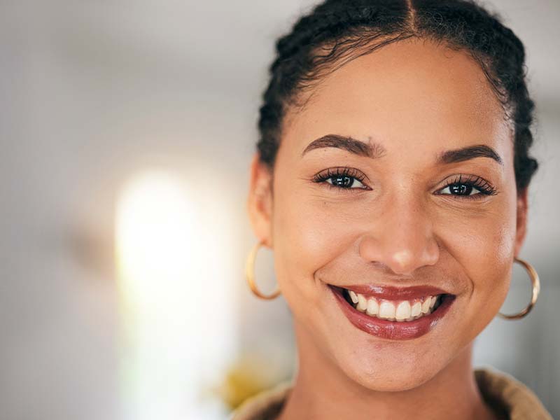 Patients smiling for a general dentistry guide