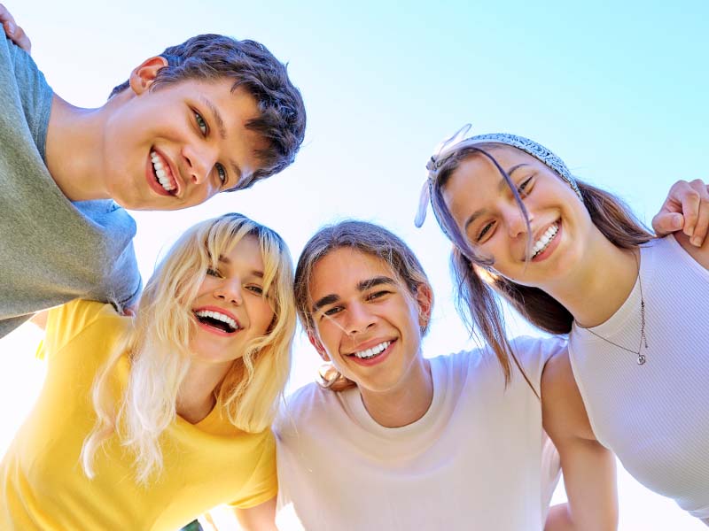 Patients smiling for a preventive dentistry guide